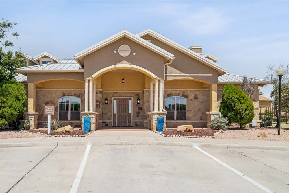 Exterior of front office with clubhouse, fitness center, business center, and kitchen at Blue Ridge in Midland, Texas