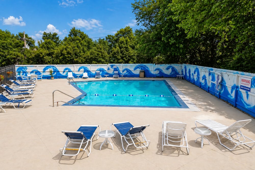 Pool with lounge style chair at Union Flats & Townhomes in Lawrence, Kansas 