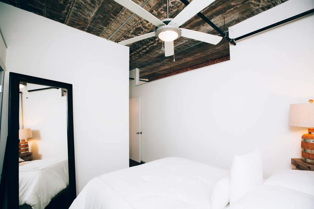 Bedroom with ceiling fan  at Courtyard Lofts at Scott’s Addition in Richmond, Virginia