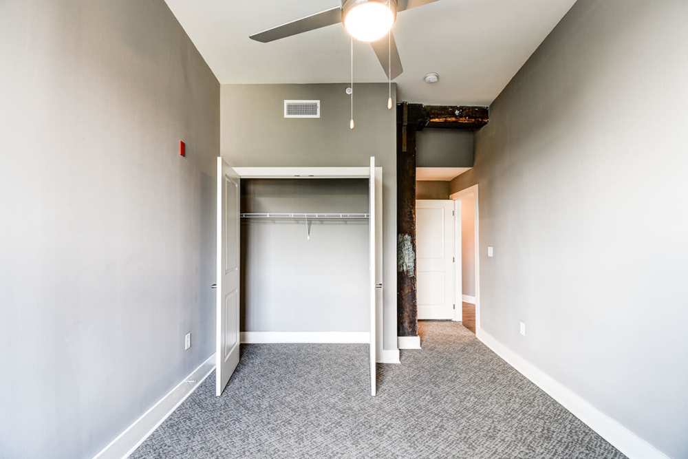 Bedroom with closet at Boury Lofts in Wheeling, West Virginia