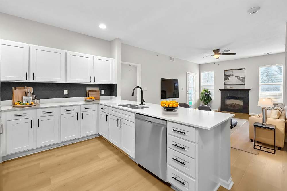 White cabinetry and white counters in kitchen at Pointe 28 in Ankeny, Iowa.