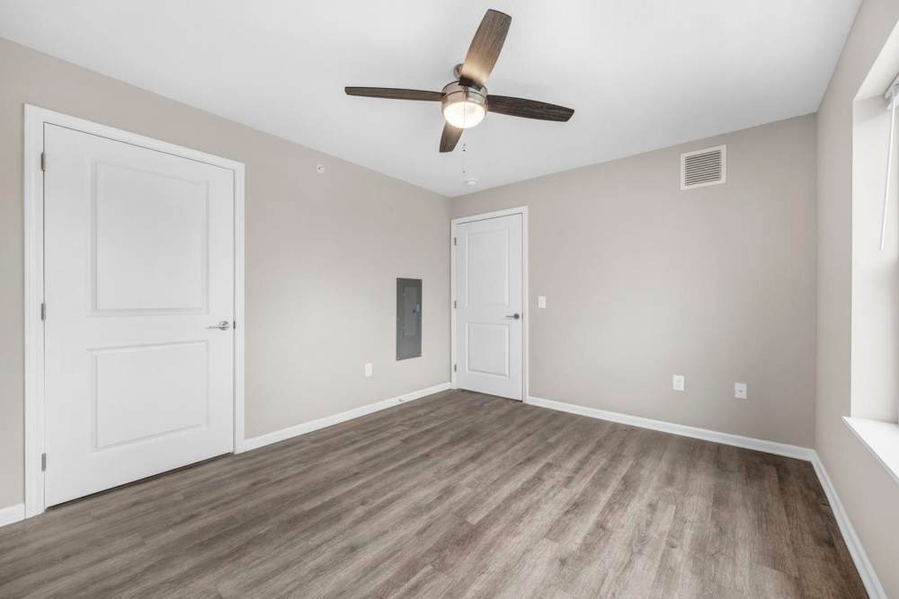 Ceiling fan with wooden blades in room at Chesterfield Terrace in Parma, Ohio