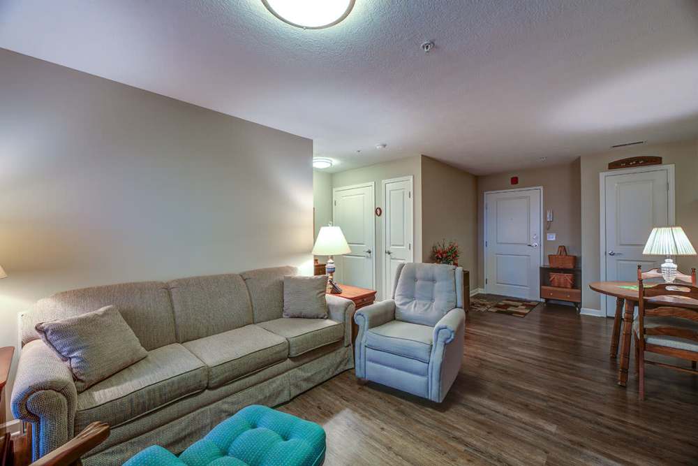 Living room with a couch at Willoughbeach Terrace Senior Living in Willowick, Ohio 
