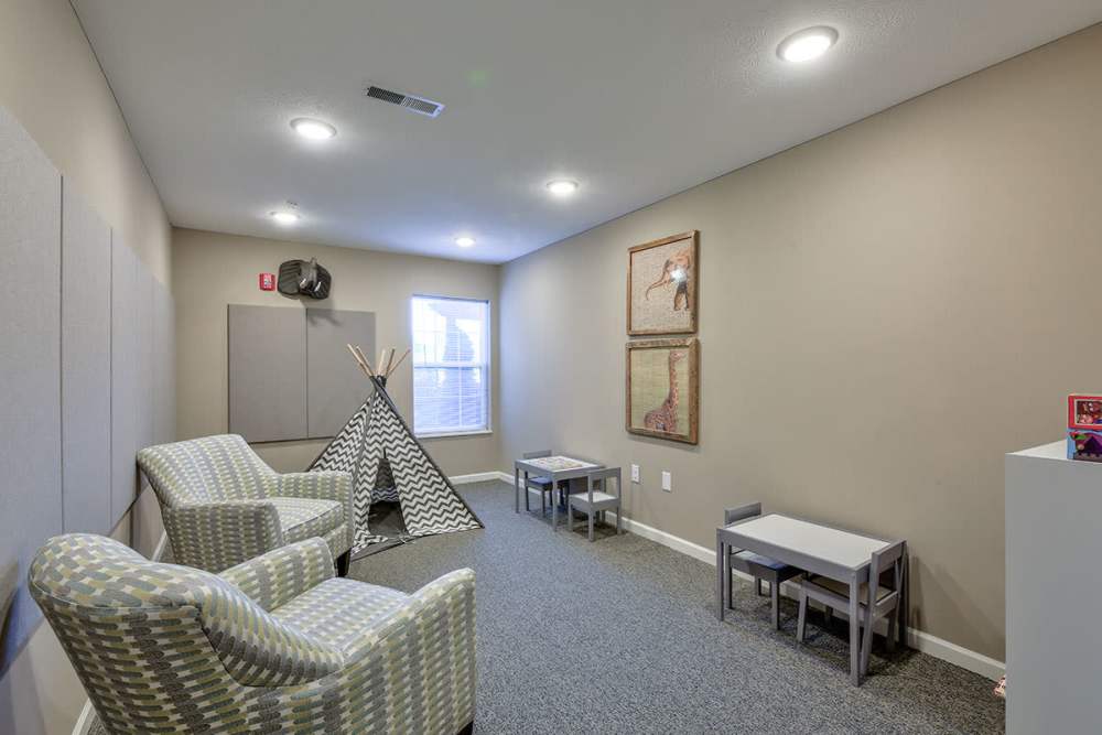 Community room with proper lighting at Willoughbeach Terrace Senior Living in Willowick, Ohio 