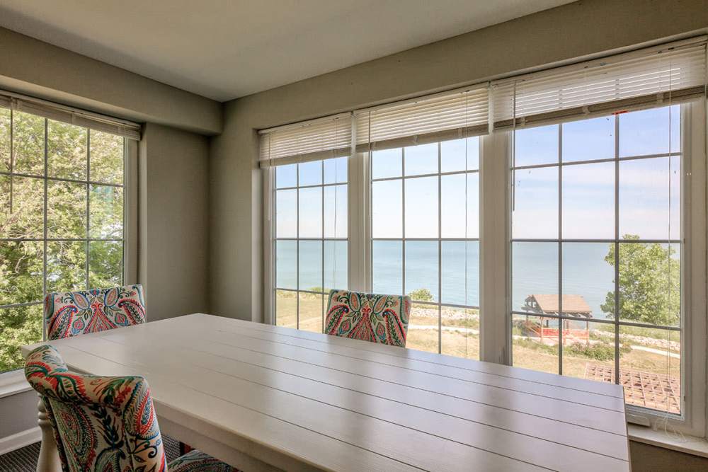 Clubhouse with a table and chairs around at Willoughbeach Terrace Senior Living in Willowick, Ohio