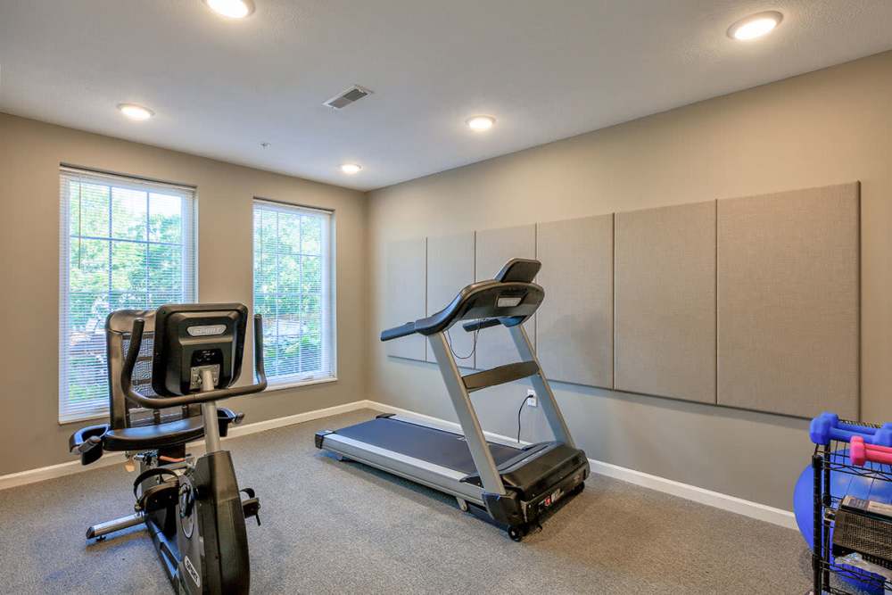 Fitness center with a treadmill at Willoughbeach Terrace Senior Living in Willowick, Ohio 