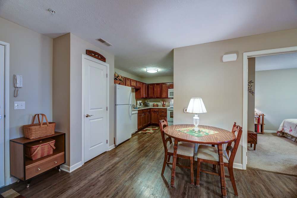 Combined view of the kitchen and dining area at Willoughbeach Terrace Senior Living in Willowick, Ohio 