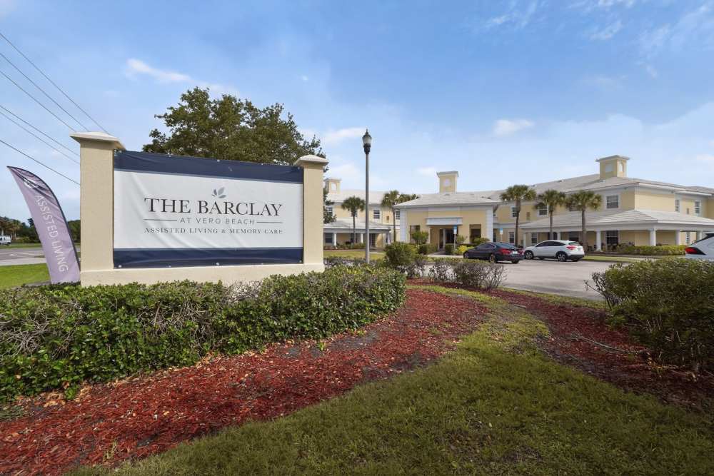 Exterior entrance sign and front drive at The Barclay at Vero Beach in Vero Beach, Florida