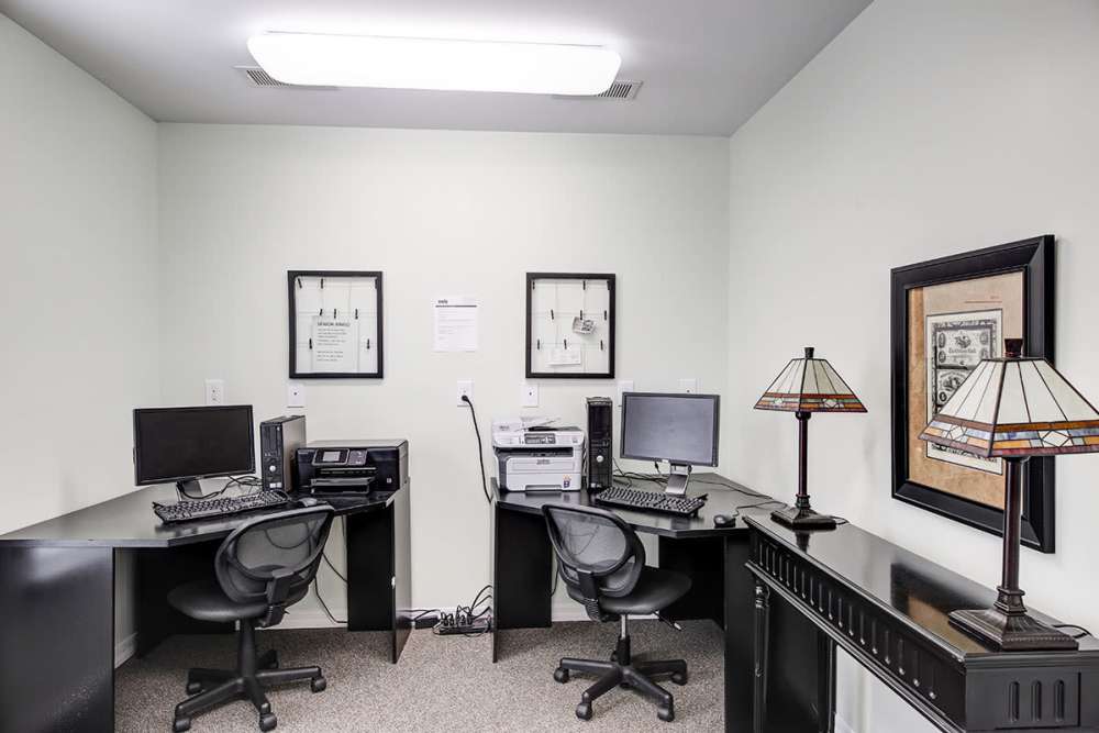 Business center with computers and printers at Crowfield Greene in Goose Creek, South Carolina
