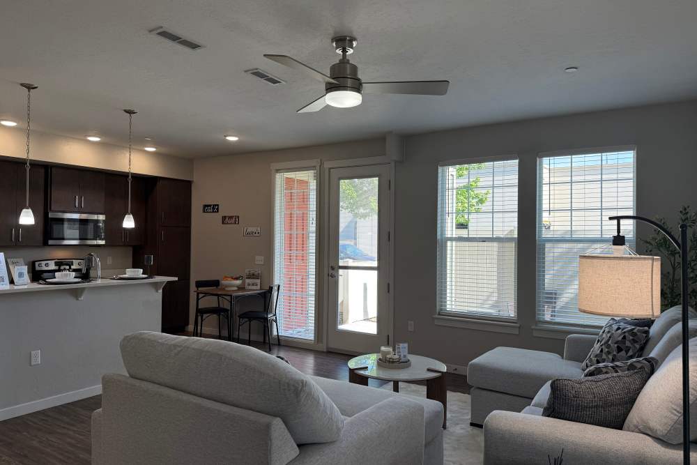 View of the kitchen and the living room at The Enclave in Meridian, Idaho