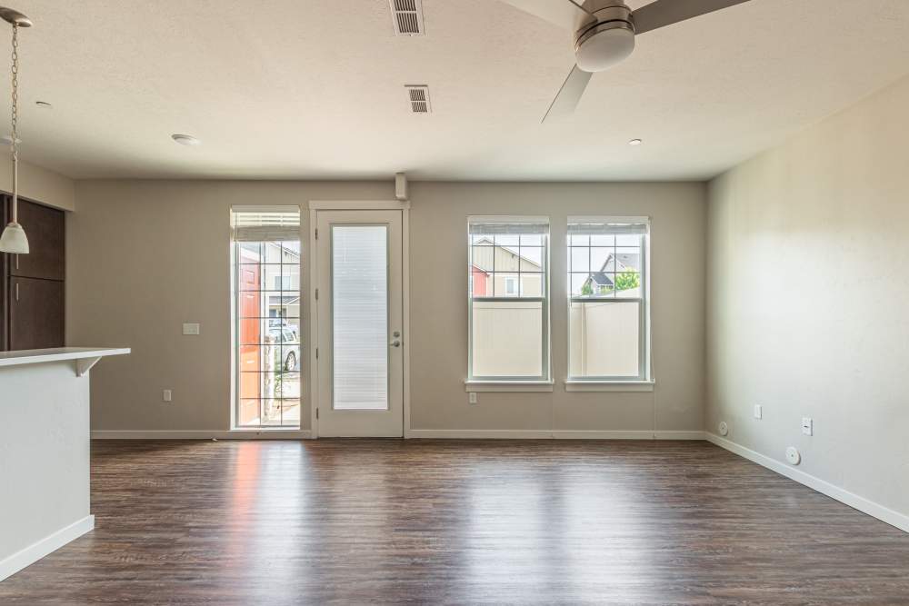 Well-lit spacious living room at The Enclave in Meridian, Idaho