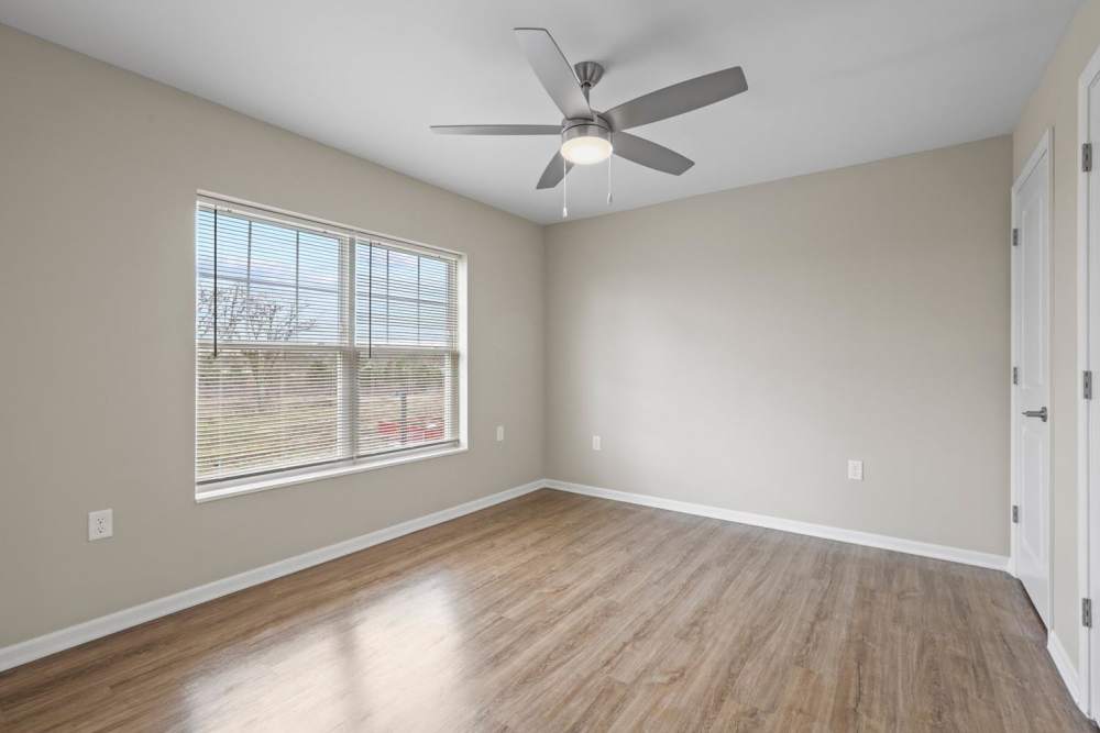 Wel-lit bedroom with a window at Dunbury Greene in Columbus, Ohio 