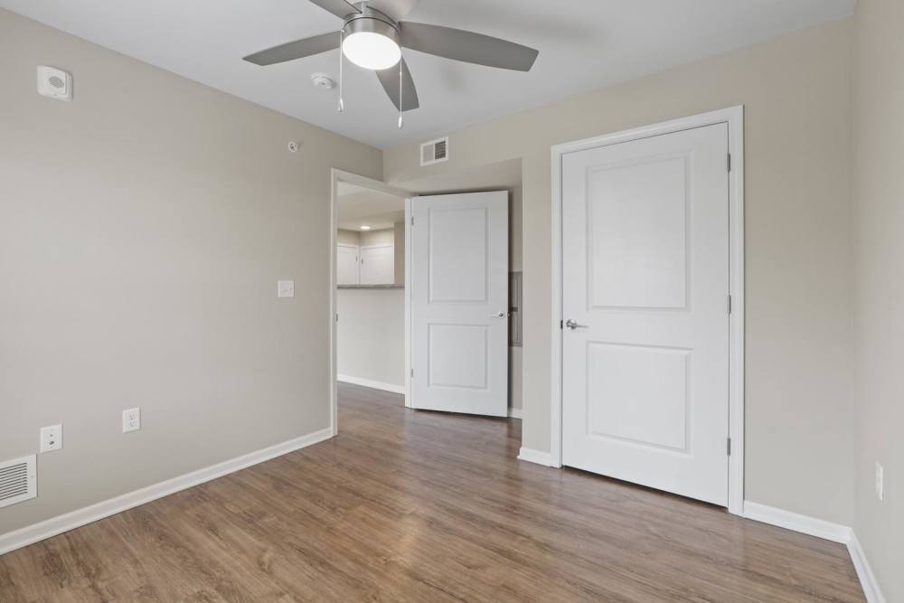 Bedroom with a walk-in closet at Dunbury Greene in Columbus, Ohio 