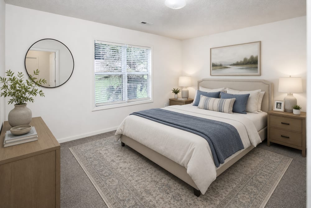 Furnished bright bedroom at Cloisters of Mount Holly in Mount Holly, North Carolina