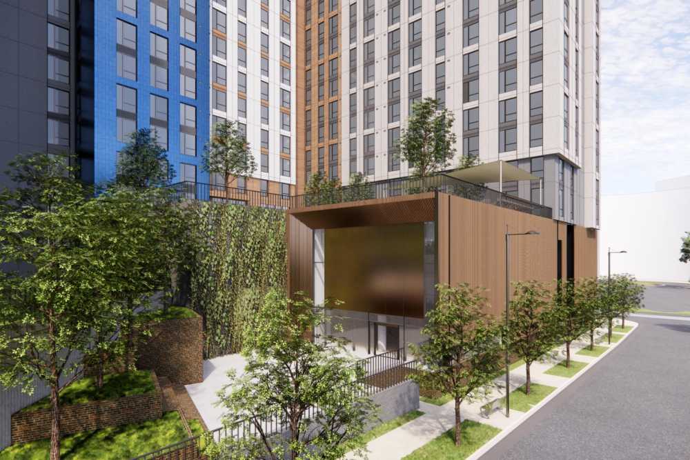 
Exterior courtyard and landscaped terraces at The Exchange at Spring Hill Station with greenery, modern building design, and outdoor spaces