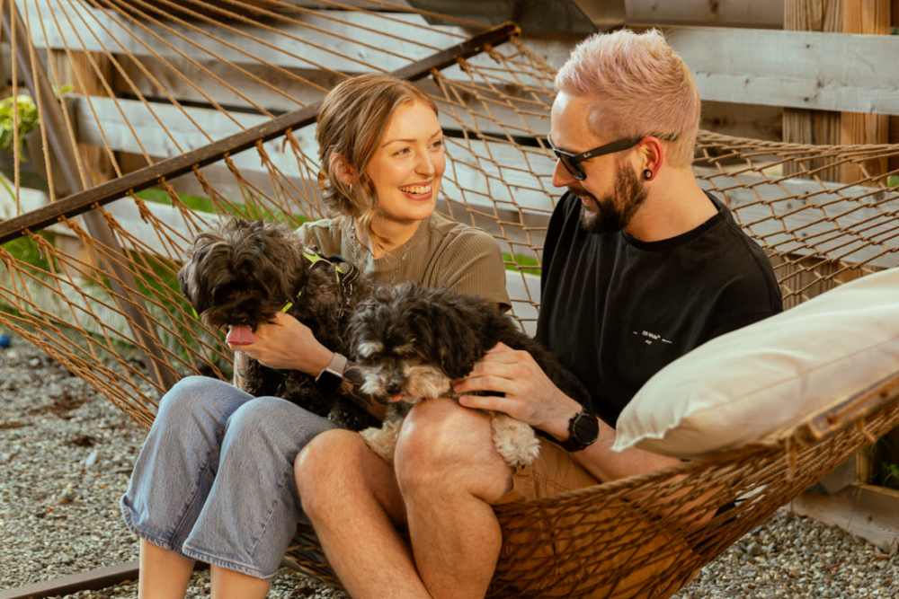 Couple and their dog at Makers Alley near Harlan Flats in Wilmington, Delaware