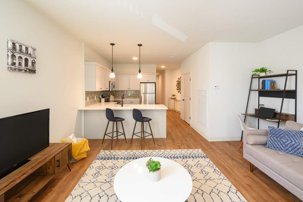 Kitchen and living room in a home at Lincoln Square in Wilmington, Delaware