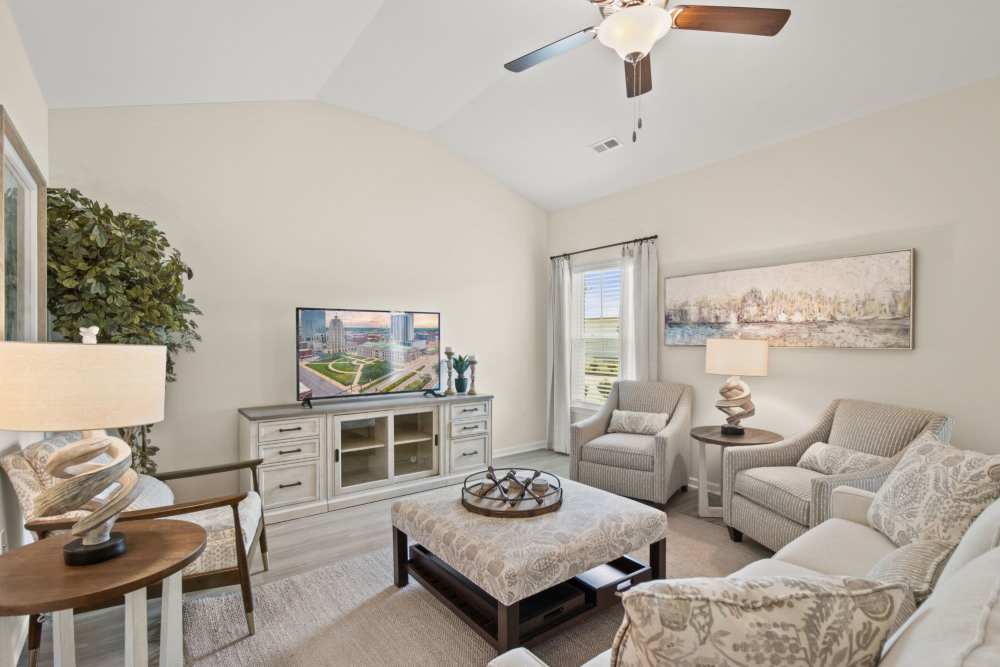 Luxurious living room at Crystal Lake & Kingsley Apartments and Townhomes in Fayetteville, North Carolina