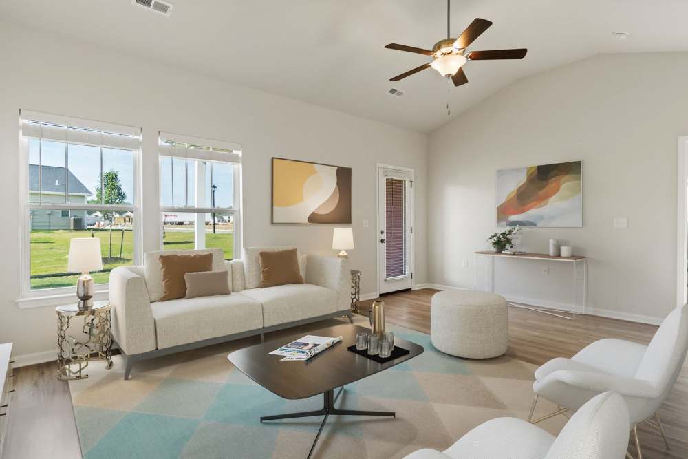 Modern living room with cool details at Crystal Lake & Kingsley Apartments and Townhomes in Fayetteville, North Carolina