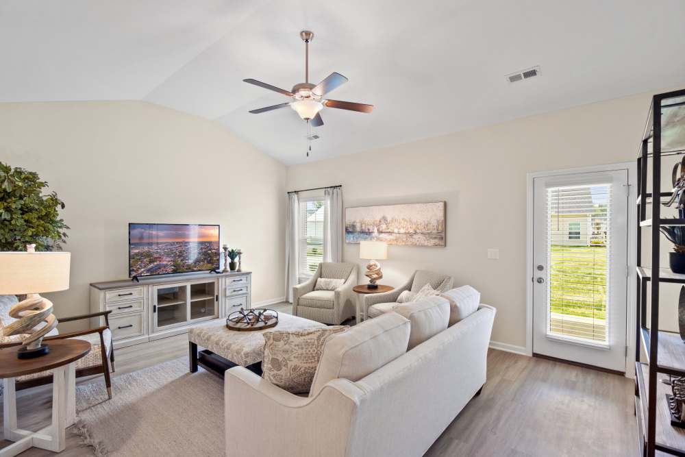 Open living room at Crystal Lake & Kingsley Apartments and Townhomes in Fayetteville, North Carolina