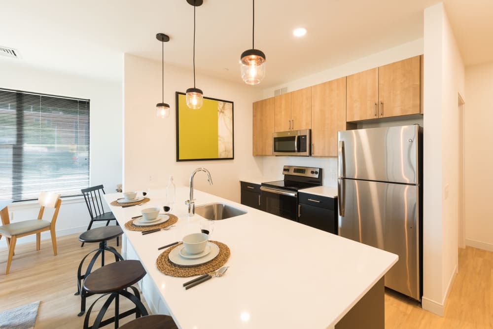 Pendant lighting over a kitchen island at The Concord in Wilmington, Delaware