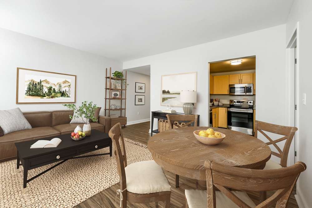 Living room and dining area in a home at The Residences at Rodney Square in Wilmington, Delaware