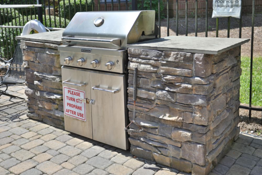Grill station with stone surround at Niner Woods in Charlotte, North Carolina
