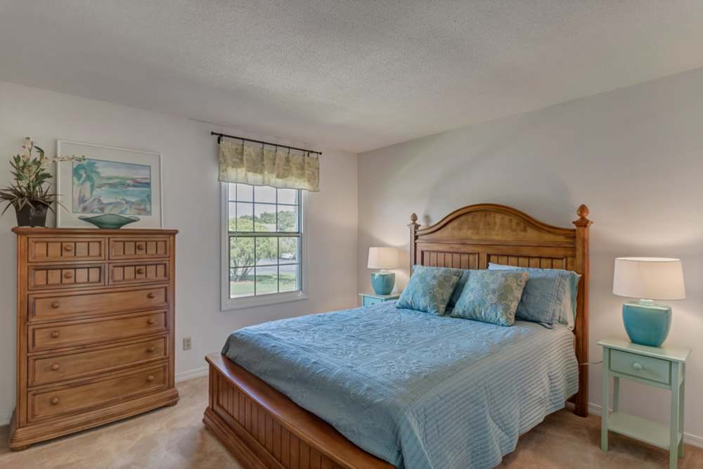 Living room with a comfortable bed at Carlton Arms Of St. Petersburg in St Petersburg, Florida 