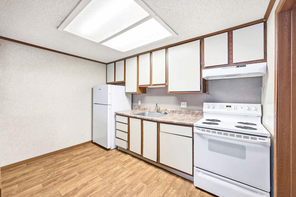 Kitchen at Candlelight Apartments in Brooksville, FL