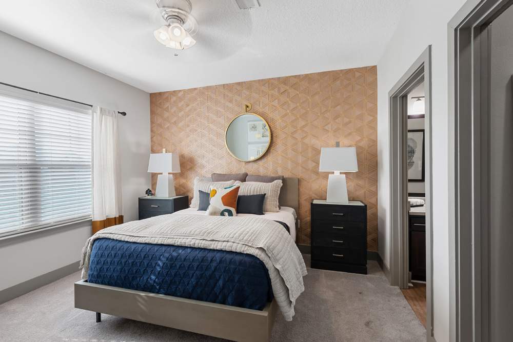 Bedroom with large windows and aesthetic wall at Langford in , North Carolina