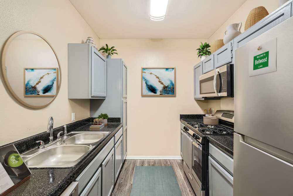 Kitchen with granite countertops at Bellwood in Round Rock, Texas 