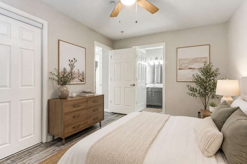 Bedroom with wall arts at Oak Place Apartment Homes in Oklahoma City, Oklahoma