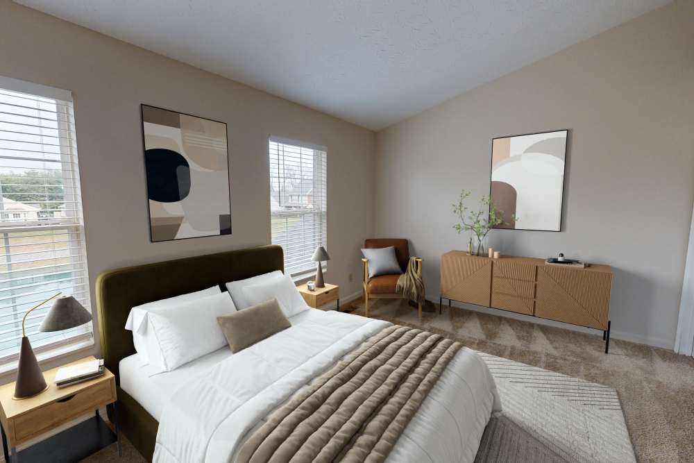 Stylish bedroom with modern decor and natural light at Whispering Wind Apartments & Townhomes in Newtown, Ohio