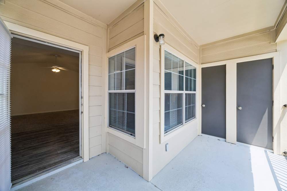Patio area at Montgomery Pines Apartments in Porter, Texas