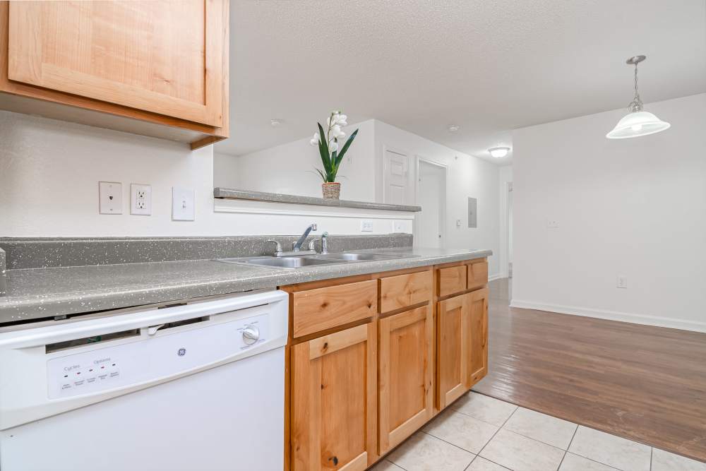 Kitchen with granite countertops at Gateway Plaza Apartments in Midland, Texas