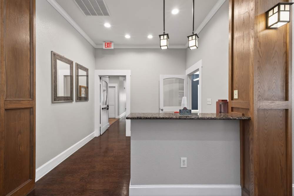 Leasing office with granite counter at Rosemont At Lakewest in Dallas, Texas