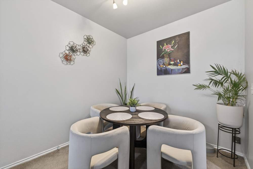 Dining area with round table at Rosemont At Lakewest in Dallas, Texas