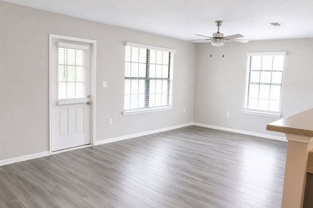Unfurnished living room with window at Lincoln Estates in Carthage, Mississippi