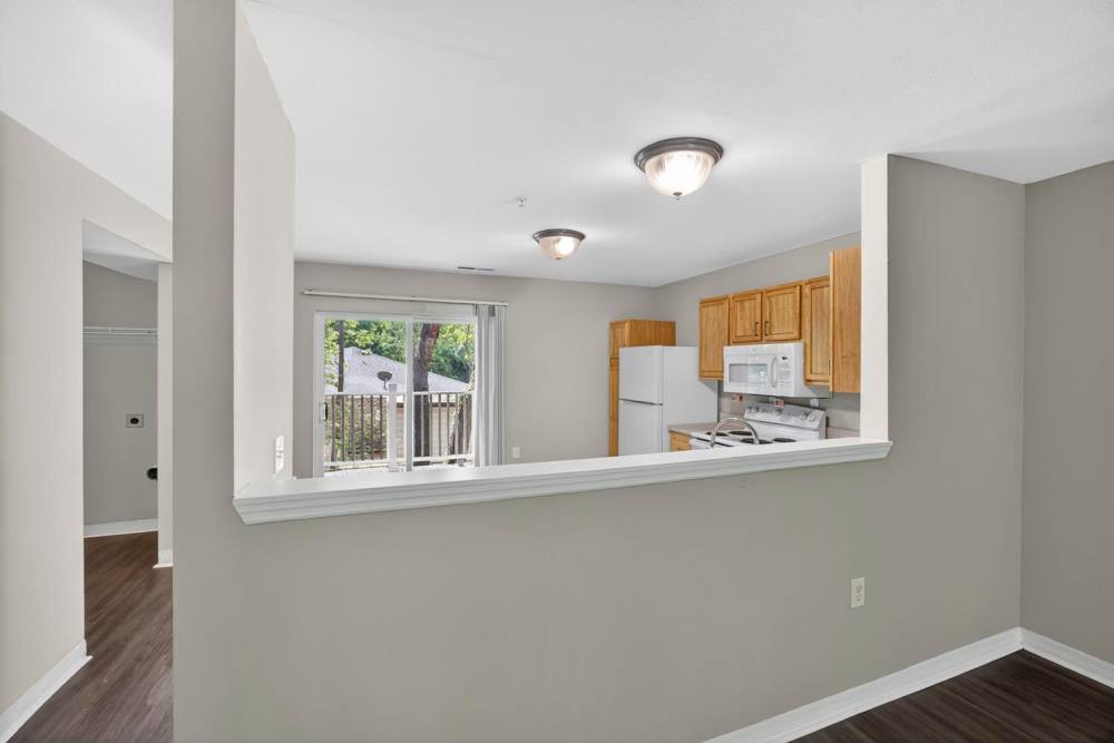 View of the kitchen from living room at Pinecrest Greene in Charleston,South Carolina
