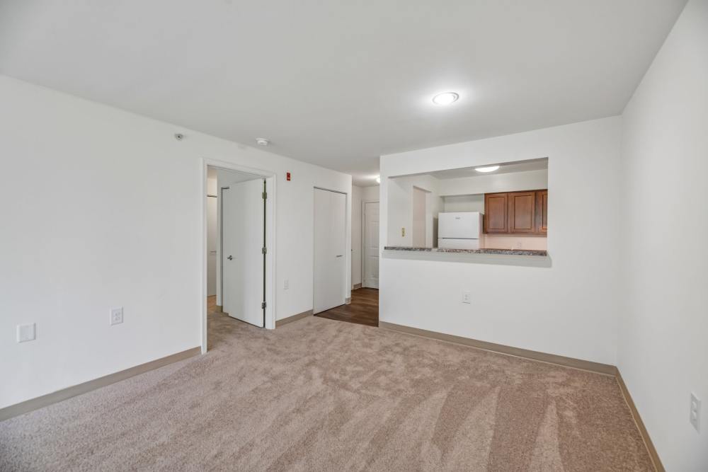 View of the kitchen from the living room at Randolph Village Senior Apartments in Silver Spring, Maryland 
