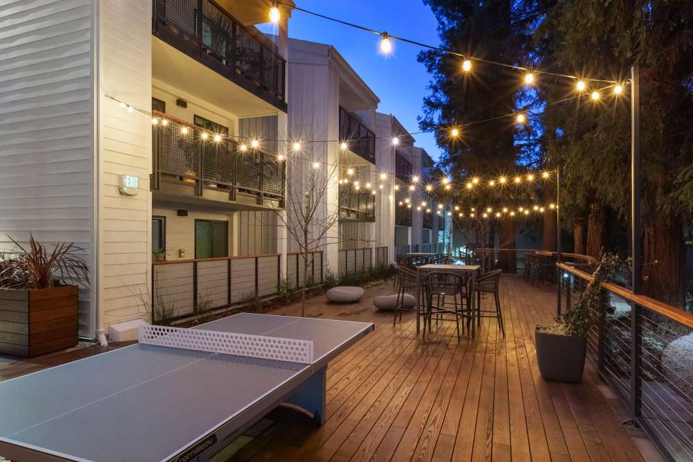 Outdoor seating area with string lights at 707 Leahy in Redwood City, California