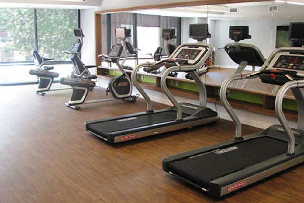 Fitness center with multiple treadmills at The Bonifant in Silver Spring, Maryland 