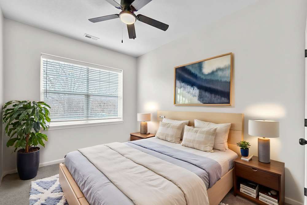 Spacious bedroom with natural light at Pointe 28 in Ankeny, Iowa.