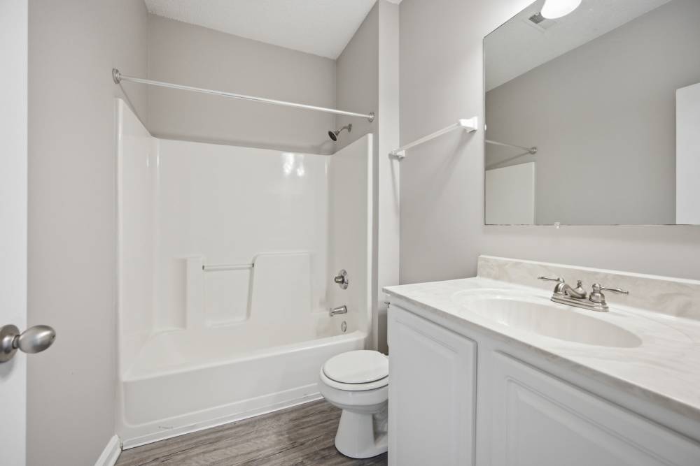 Bathroom with water faucet sink, storage space and mirror at Colts Run in Lexington, Kentucky