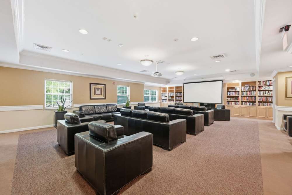 Clubhouse with lounge area cozy sofa another view at Waverly Gardens in Woodstock, Maryland