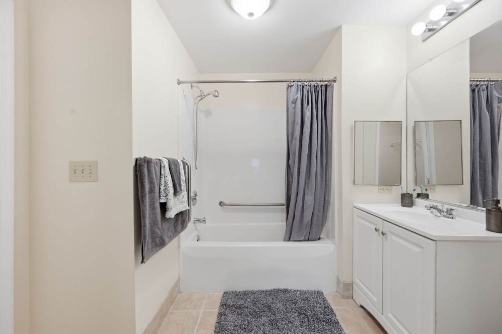 Bathroom with white color cabinet at Waverly Gardens in Woodstock, Maryland
