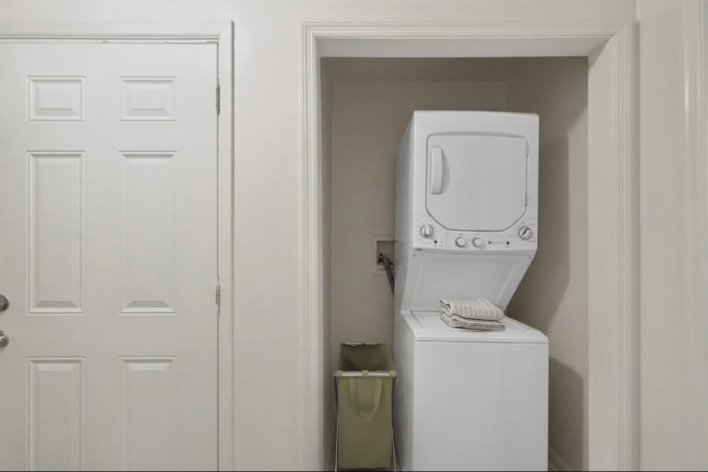 Laundry room at Patchogue Village at Rider, an Eagle Rock Community in Patchogue, New York