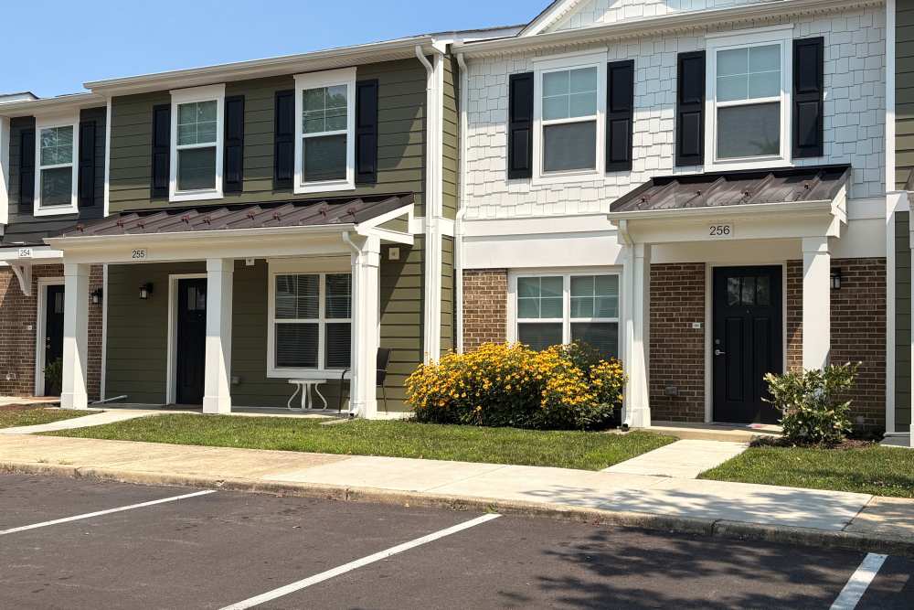 Building exterior with upgraded siding at The Towns at Patuxent Overlook in Lexington Park, Maryland