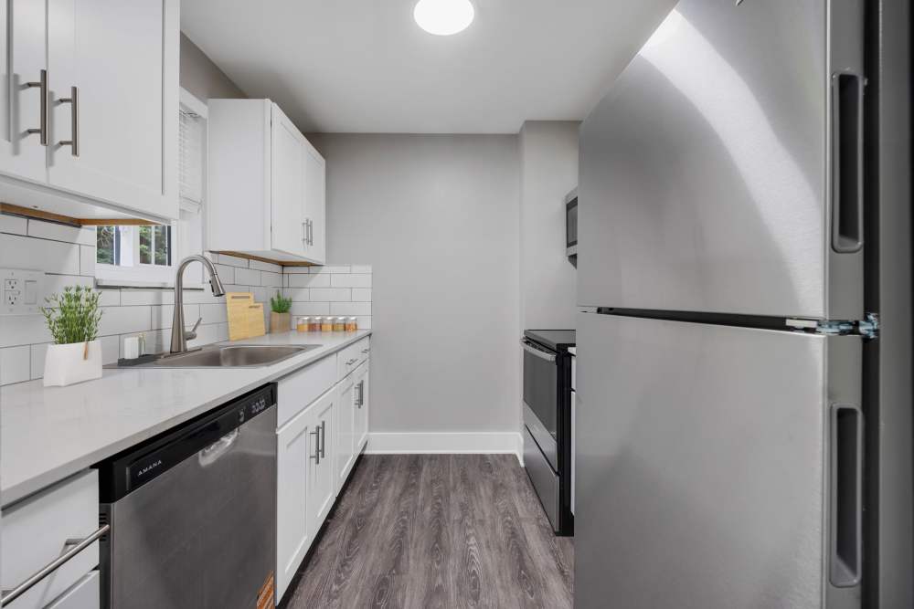 Granite countertops and stainless steel appliances at Valley Brook Townhomes in Rochester, New York
