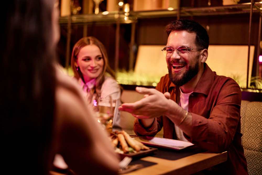 Residents eating at a restaurant near Winston Heights in Houston, Texas
